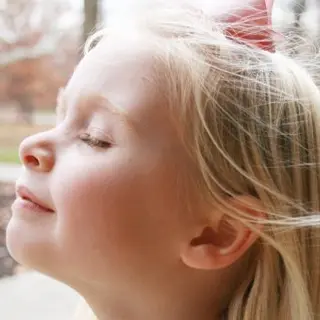 Maya with wind blowing through her hair
